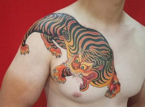 Vietnamese tradional tiger tattoo made at Dragon City Ink Da Nang.